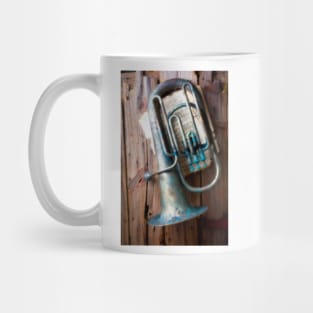 Weathered Tuba Hanging On Old Wall Mug